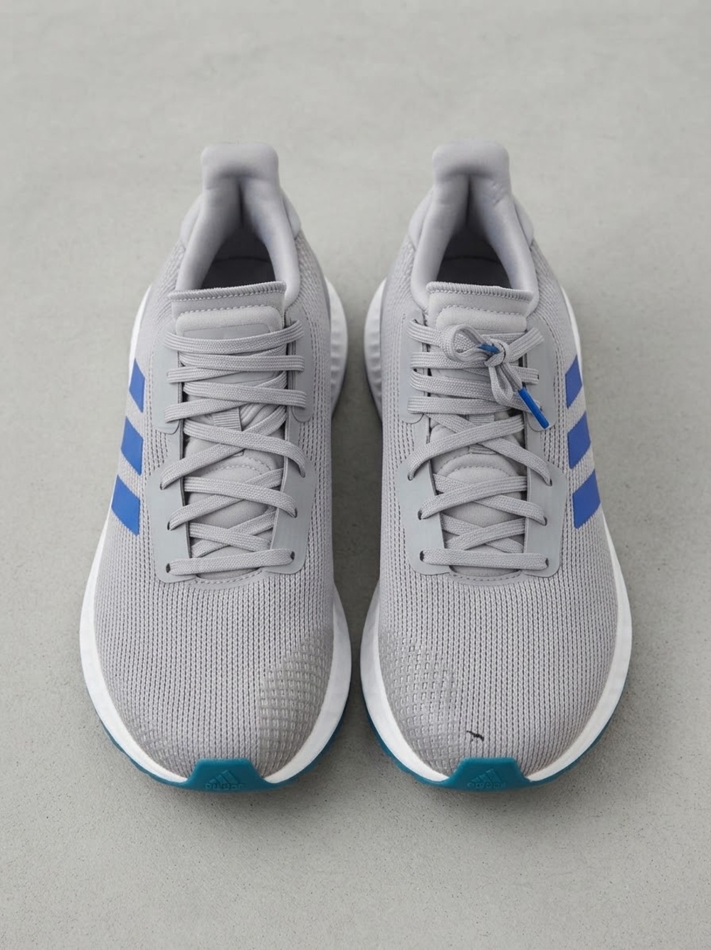 adidas Originals Men's Light Gray Sneakers with Blue Stripes